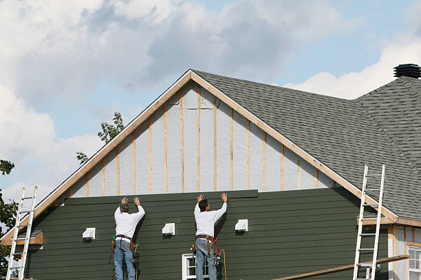 Professional Siding Installation technician working in Sequim, WA